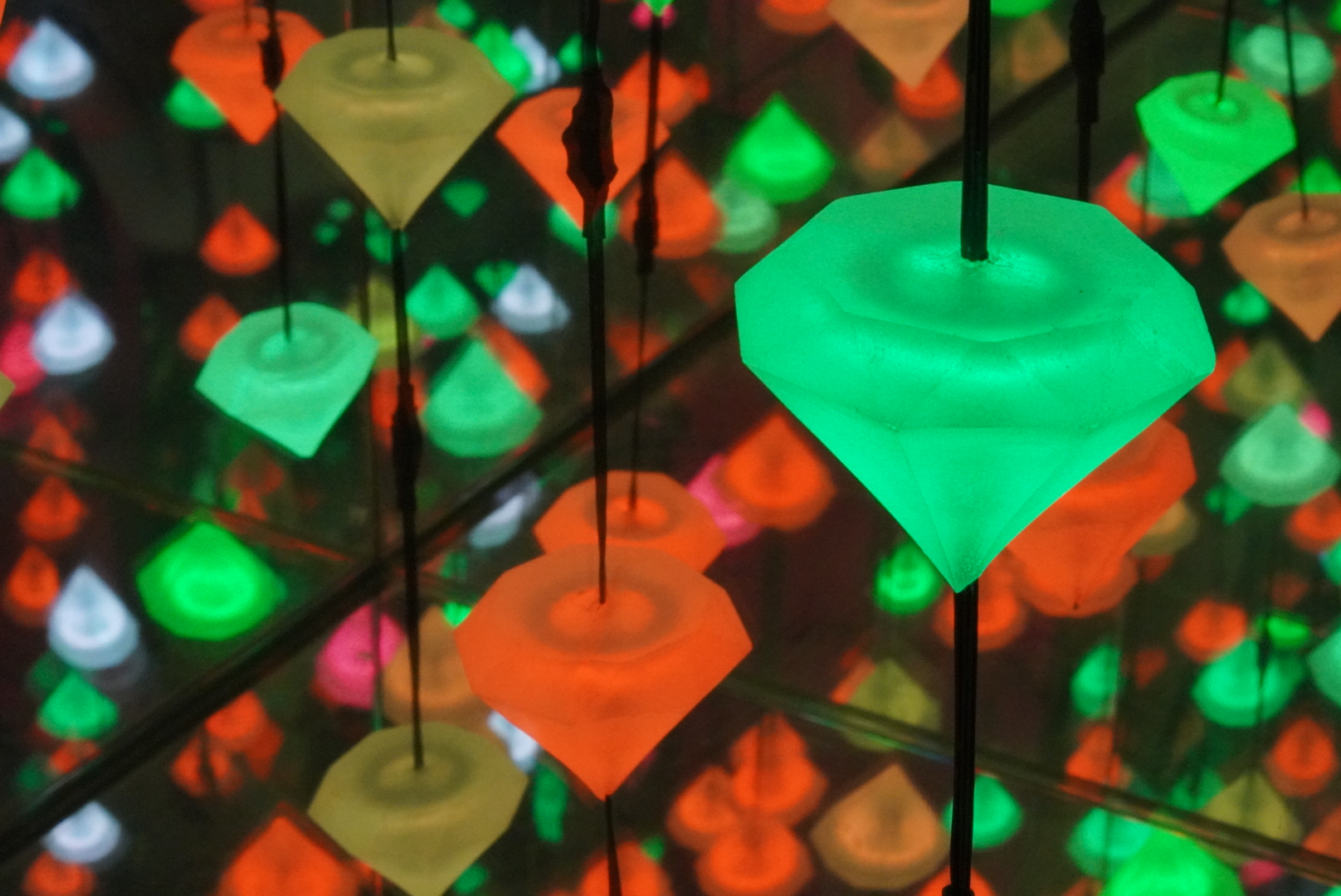 Diamond-shaped lighting fixtures in bright colors.