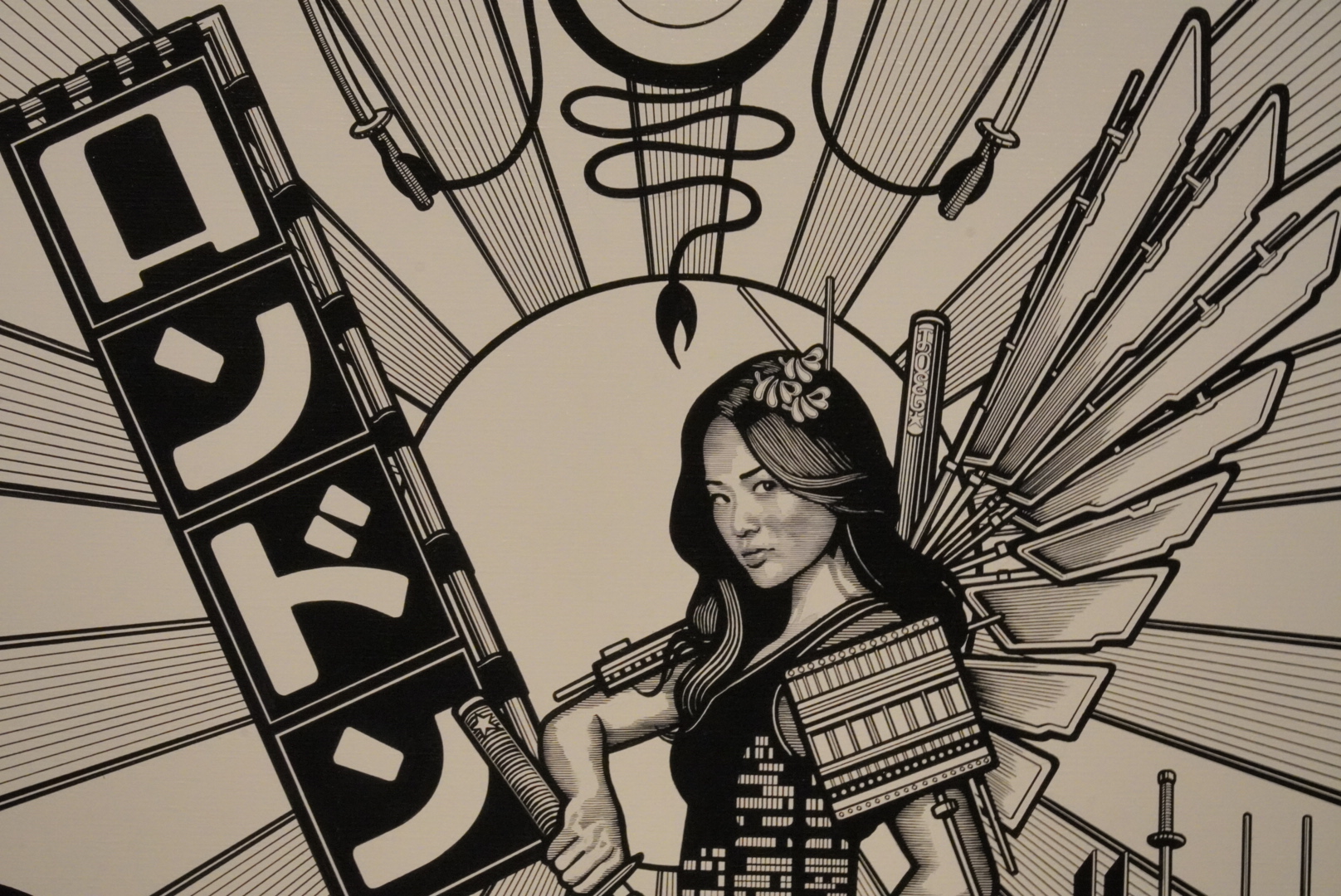 Female samurai with wings holding sword next to stylized Kanji.